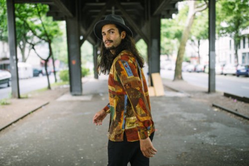 young man walking under the bridge in city - fashion stock pictures, royalty-free photos & images
