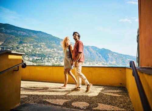 young millennial couple enjoying their trip to menton, while travelling in the south of france. - travel stock pictures, royalty-free photos & images