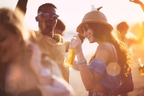 young multi-ethnic hipster friends dancing at summer beach party - concert stock pictures, royalty-free photos & images