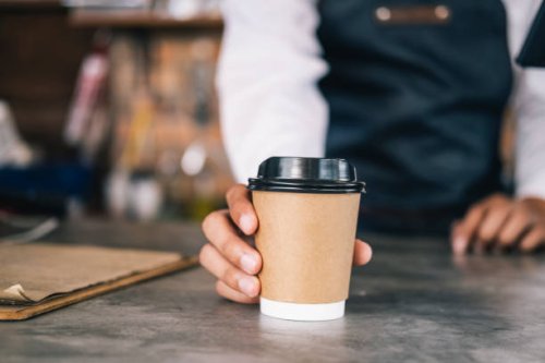 young owner of coffee cafe service customer. - junk food stock pictures, royalty-free photos & images