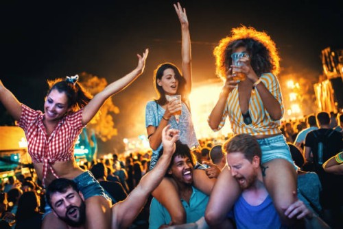 young people dancing at a concert. - concert stock pictures, royalty-free photos & images