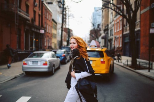 young redhead woman walking on the streets of west village, manhattan, ny - fashion stock pictures, royalty-free photos & images