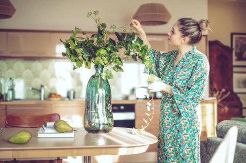 young woman at home - home decoration stock pictures, royalty-free photos & images