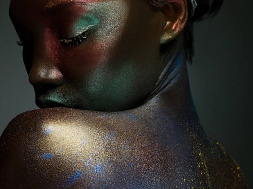 young woman covered in metallic make up - fashion stock pictures, royalty-free photos & images
