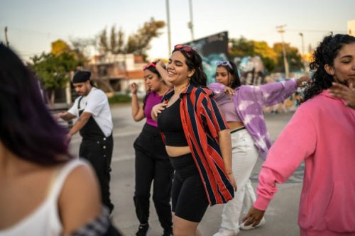 young woman dancing and having fun with her friends at skateboard park - concert stock pictures, royalty-free photos & images