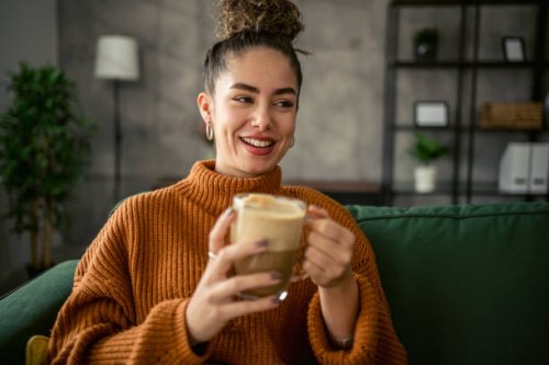 young woman drinking coffee in the morning - coffee stock pictures, royalty-free photos & images