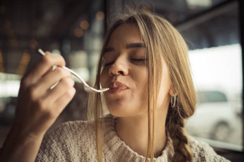 young woman eating dessert - food stock pictures, royalty-free photos & images