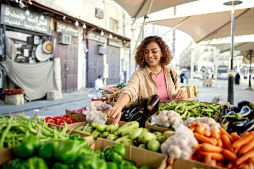 young woman grocery shopping at outdoor market - food stock pictures, royalty-free photos & images