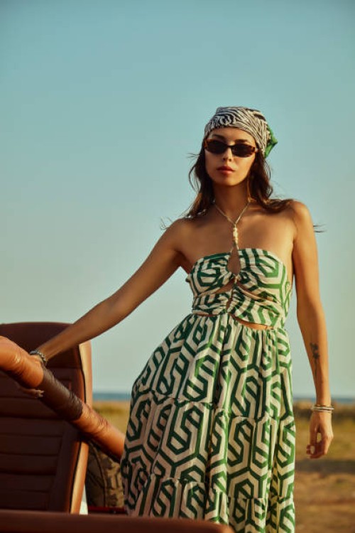 young woman immersing herself in nature with an open-top off-road vehicle. - fashion stock pictures, royalty-free photos & images