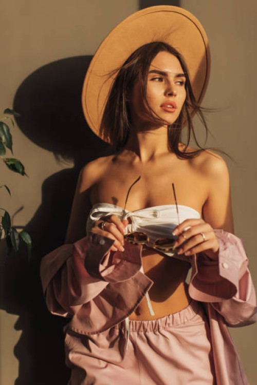 young woman in studio in summer clothes. modern fashion. - fashion stock pictures, royalty-free photos & images