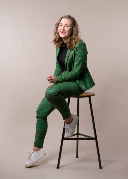 young woman on a stool - fashion stock pictures, royalty-free photos & images