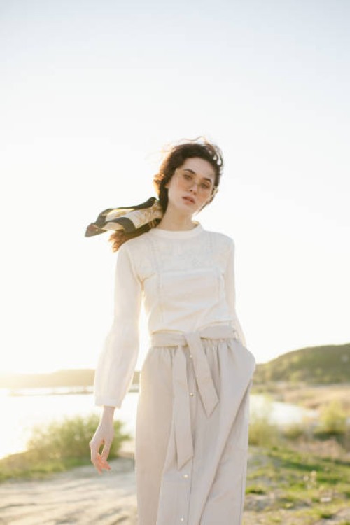 young woman posing outdoors - fashion stock-fotos und bilder