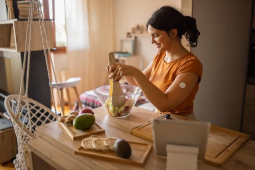 young woman preparing a healthy salad - food stock pictures, royalty-free photos & images
