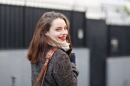 young woman walking in the street - fashion stock pictures, royalty-free photos & images