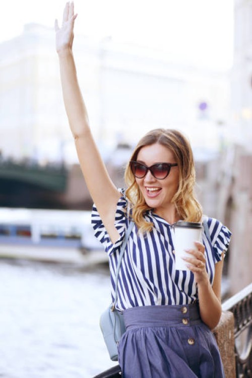 young woman walks in saint-petersburg( coffee) - junk food stock pictures, royalty-free photos & images
