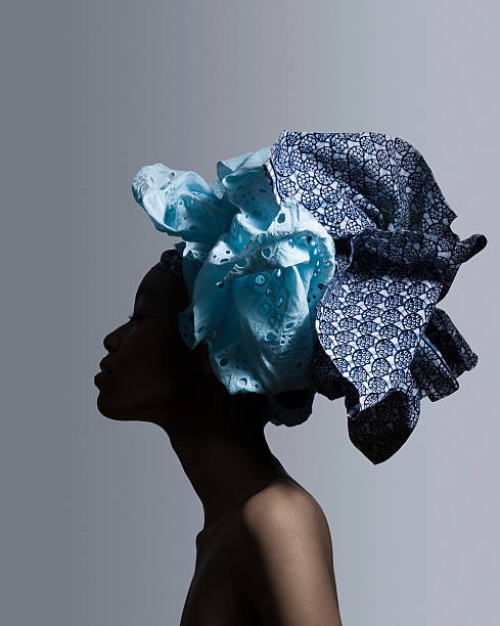 young woman wearing head tie - fashion stock pictures, royalty-free photos & images