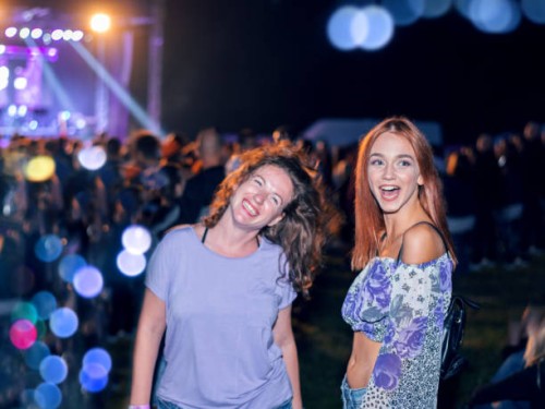 young women enjoying a concert - concert stock pictures, royalty-free photos & images