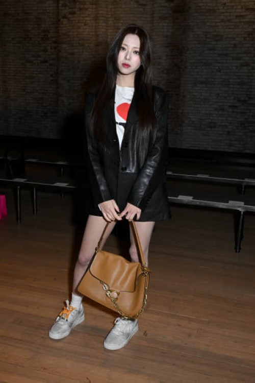 Yuna Shin at the Coach Fall RTW 2025 fashion show as part of New York Fashion Week held at the Park Avenue Armory on February 10, 2025 in New York,...