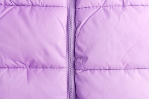 zipper on a quilted jacket. close-up of puffer jacket texture with zipper - fashion stock pictures, royalty-free photos & images